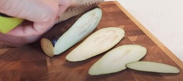 Мясо и не нужно: рецепт вкусных баклажанов под сыром с ароматным чесноком Мясо и не нужно: рецепт вкусных баклажанов под сыром с ароматным чесноком